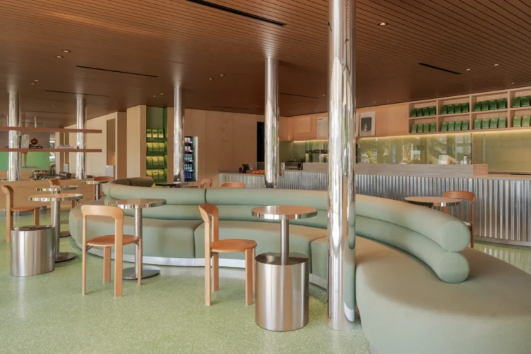 Walnut wood-look aluminum ceiling at a Blank Street cafe in Los Angeles